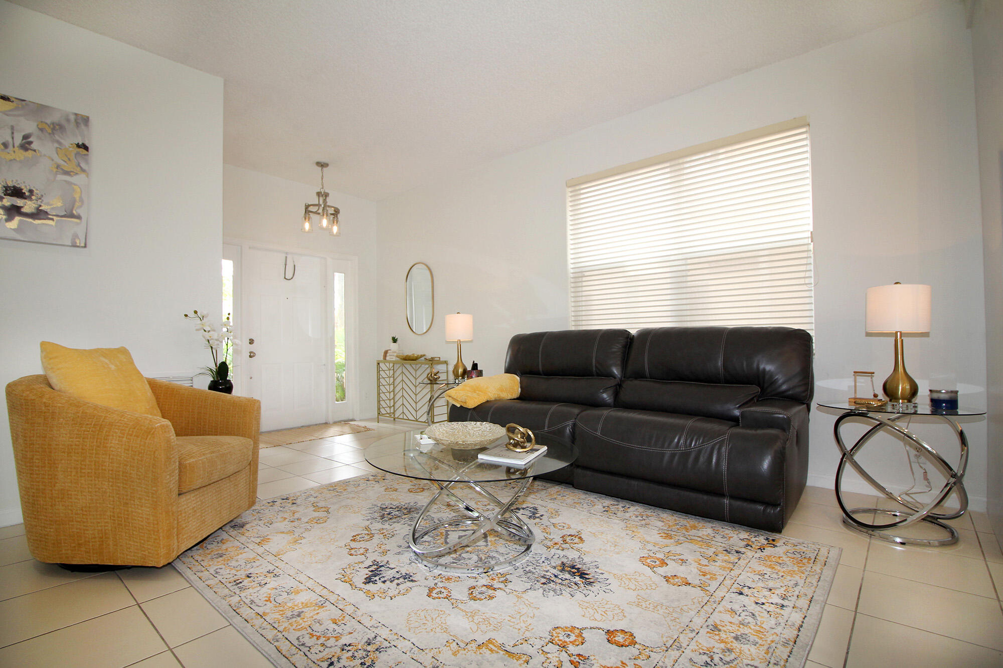 5809 Raceway Road Lake Worth, FL 33449 - Photo 2 of 13 a living room with furniture a rug and a window