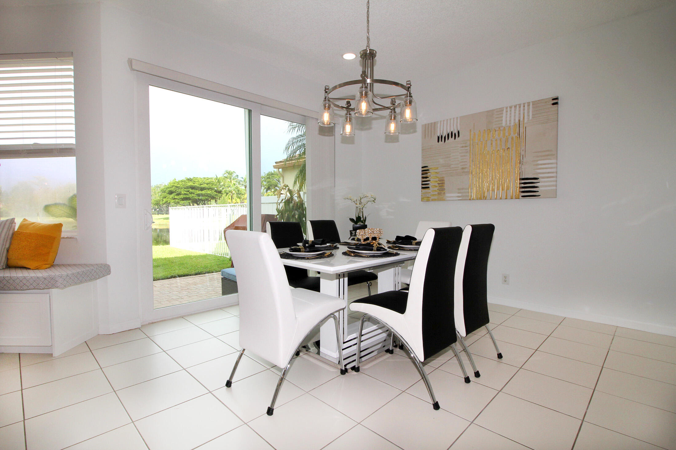 5809 Raceway Road Lake Worth, FL 33449 - Photo 8 of 13 a view of a dining room with furniture window and outside view