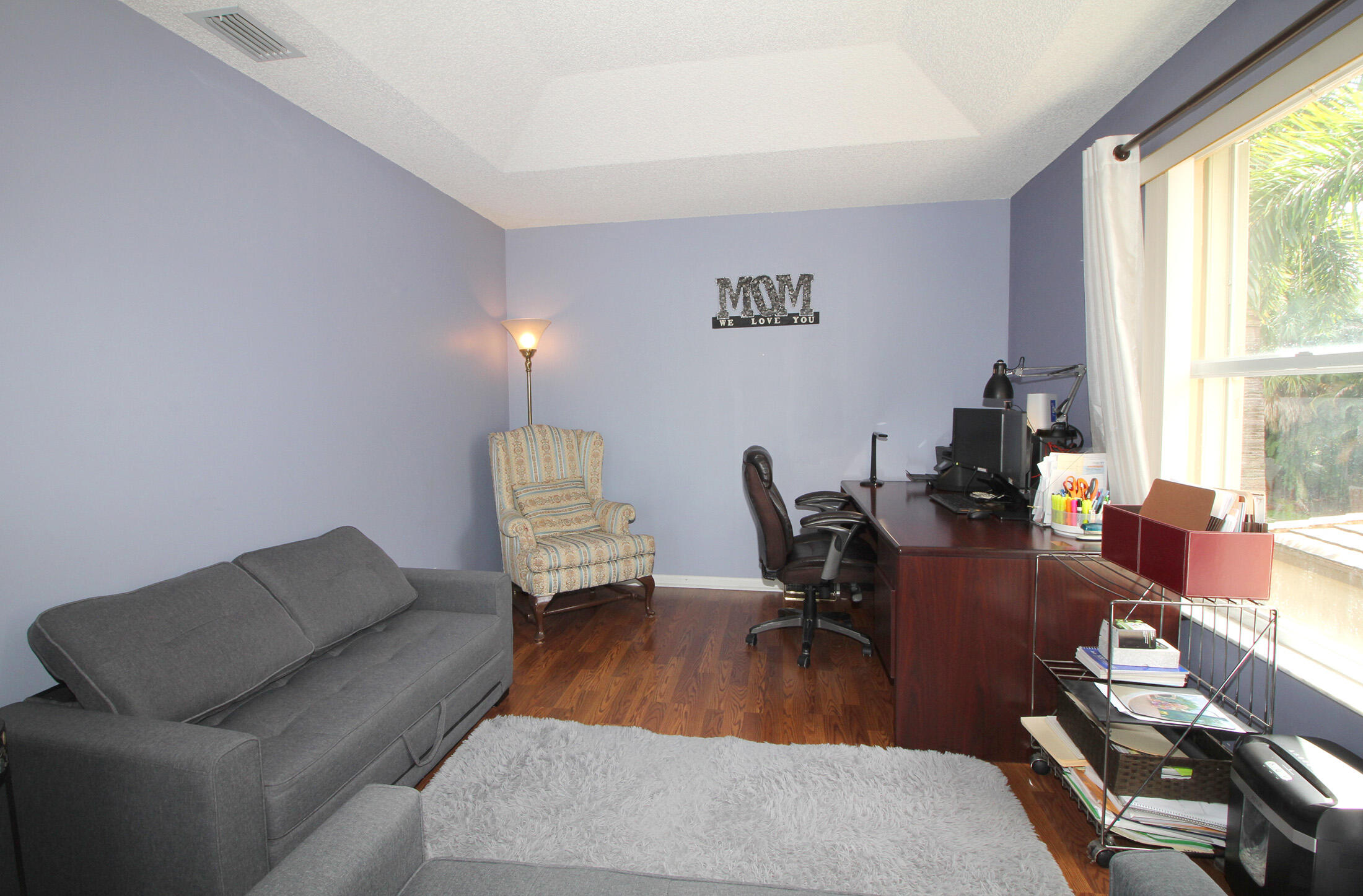 5809 Raceway Road Lake Worth, FL 33449 - Photo 10 of 13 a workspace with furniture and a window