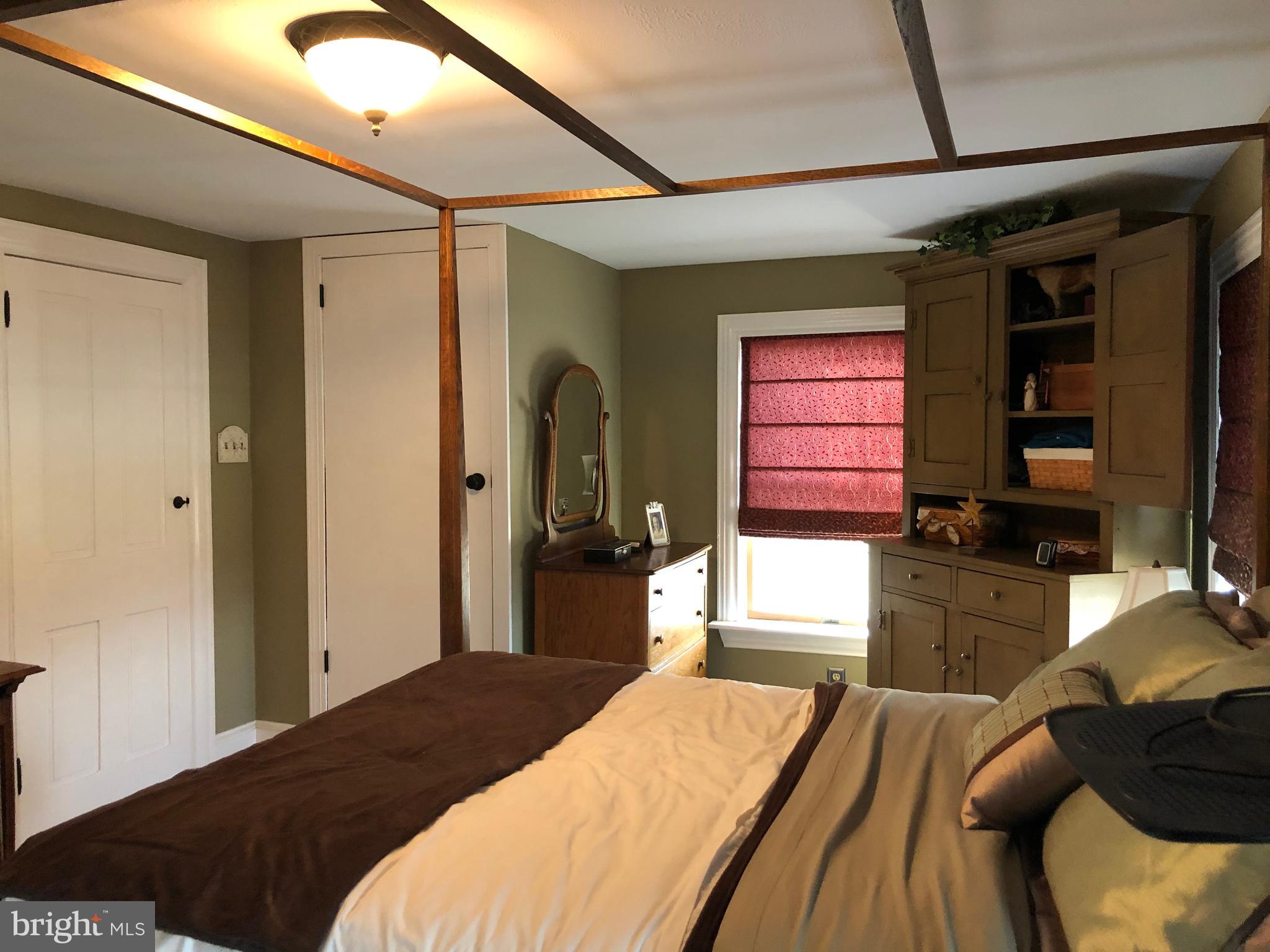 1348 Swamp Road Furlong, PA 18925 - Photo 22 of 36 Master Bedroom with door to the Attic