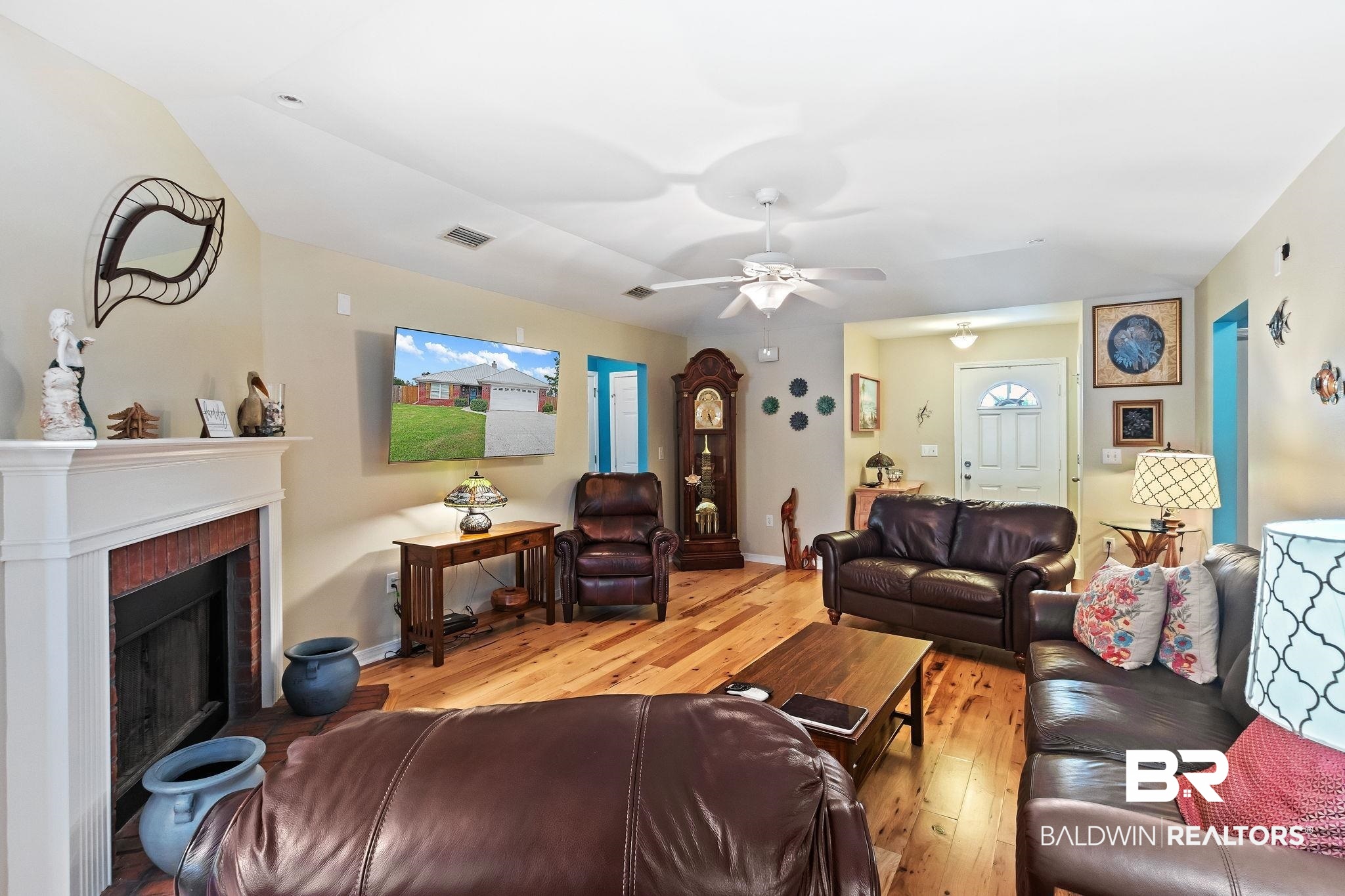16898 Sugar Loop Foley, AL 36535 - Photo 16 of 67 Living room featuring ceiling fan and light hardwood / wood-style flooring