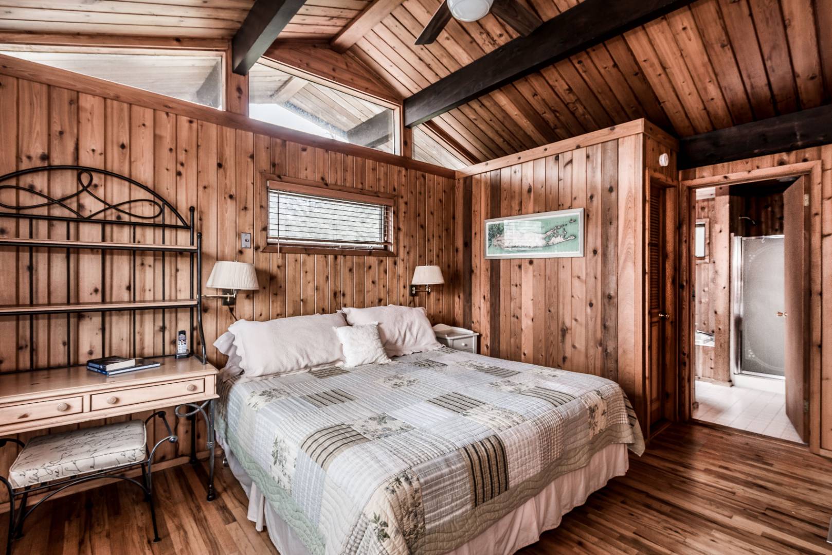 72 Fenmarsh Road East Hampton, NY 11937 - Photo 13 of 20 a bedroom with a bed window and a table