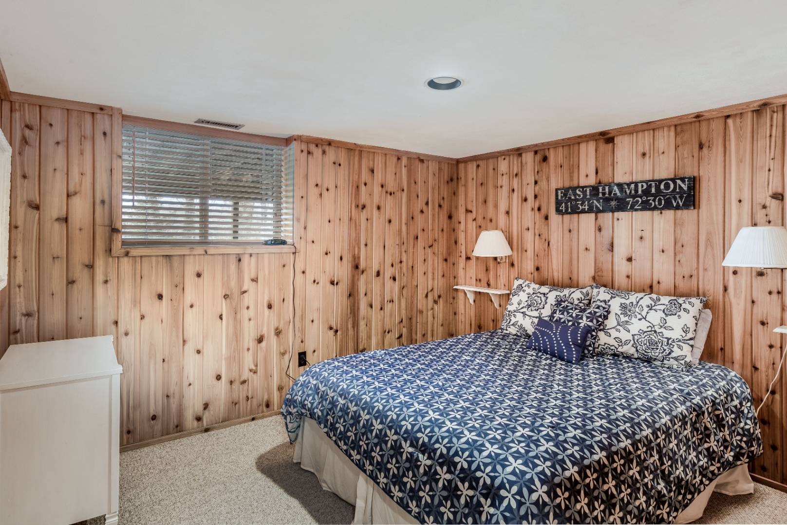 72 Fenmarsh Road East Hampton, NY 11937 - Photo 14 of 20 a bedroom with a bed and a window