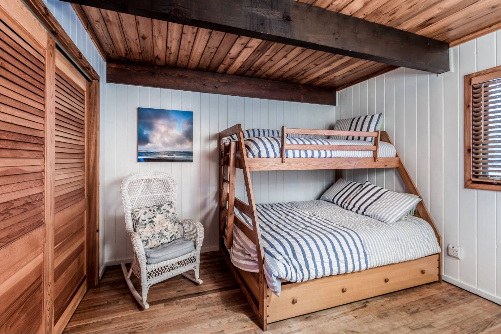 72 Fenmarsh Road East Hampton, NY 11937 - Photo 16 of 20 a bedroom with a bed and a window
