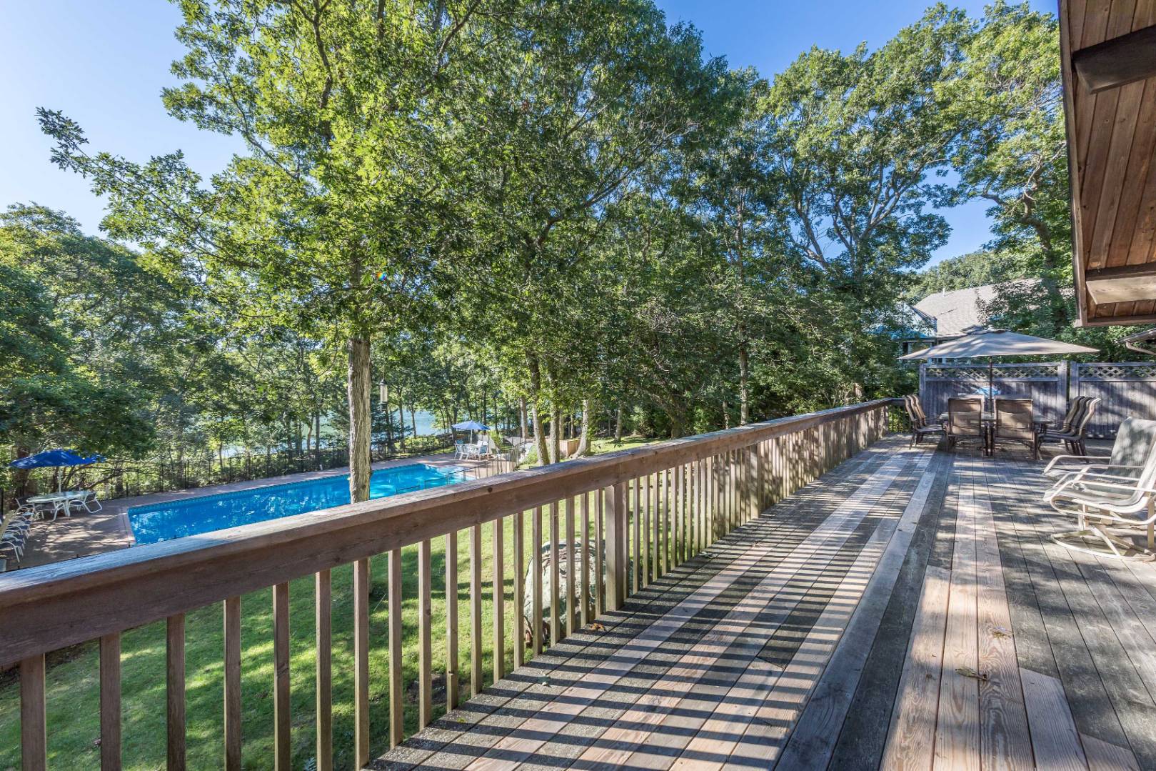72 Fenmarsh Road East Hampton, NY 11937 - Photo 18 of 20 a view of balcony with wooden floor and fence