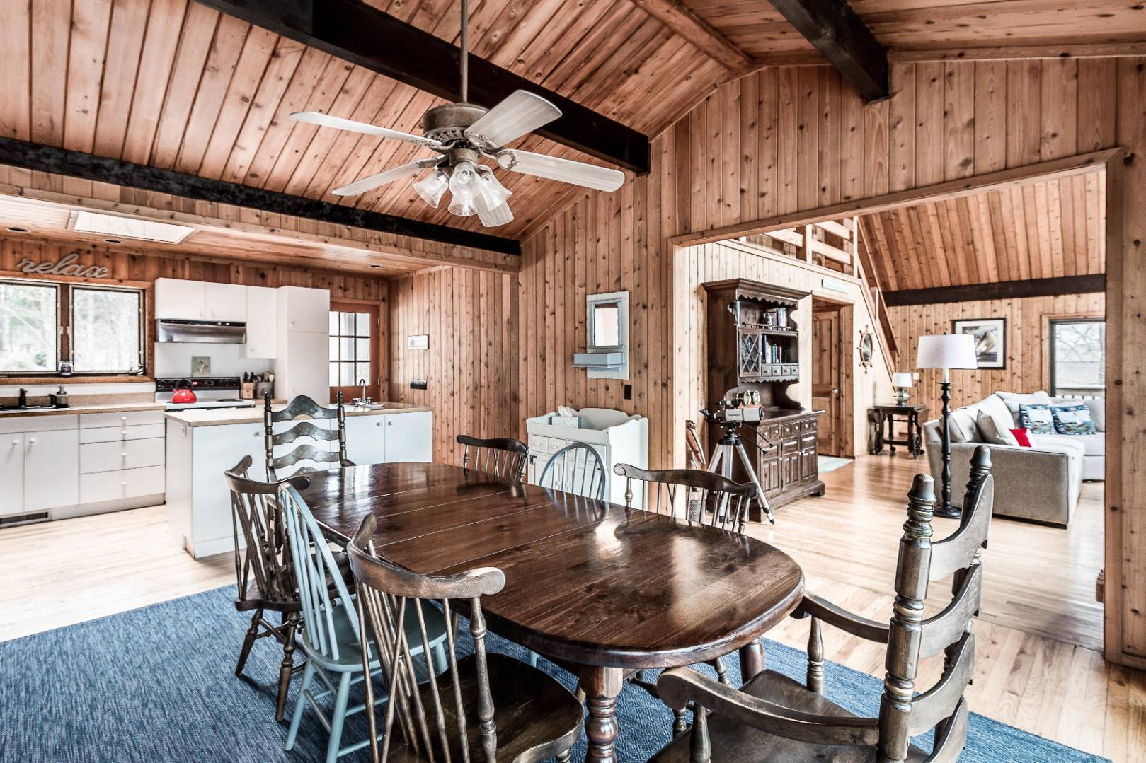 72 Fenmarsh Road East Hampton, NY 11937 - Photo 5 of 20 a dining room with furniture a wooden table and chairs