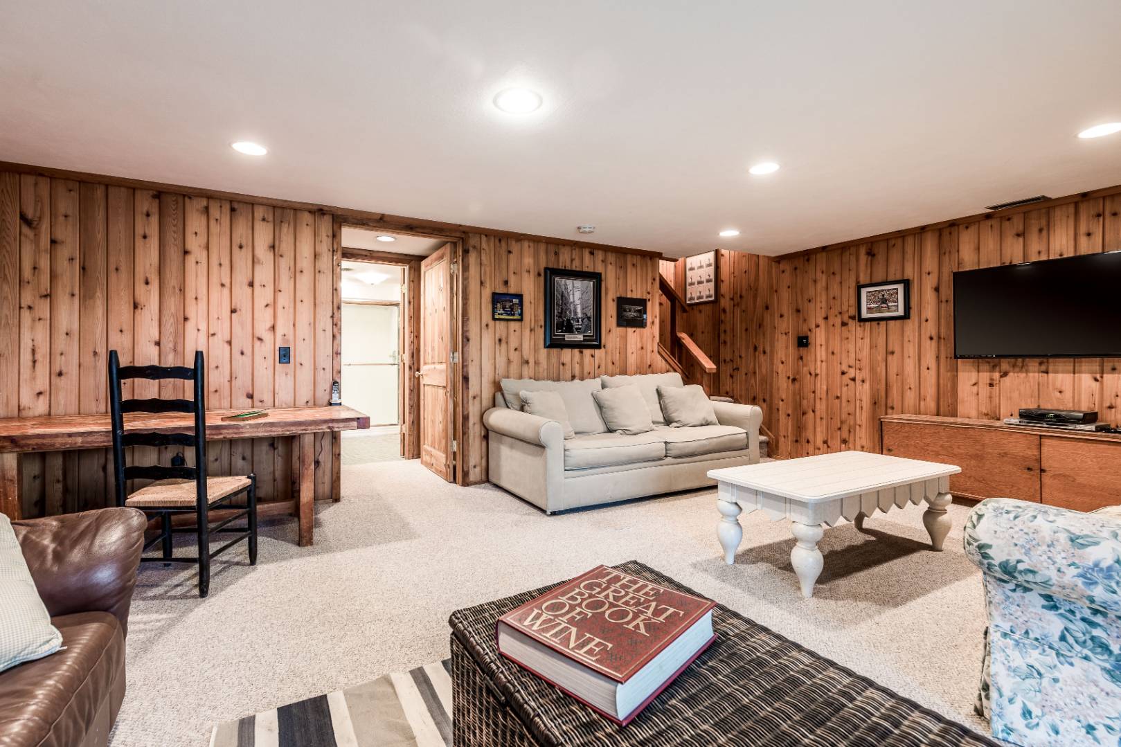 72 Fenmarsh Road East Hampton, NY 11937 - Photo 9 of 20 a living room with furniture and a flat screen tv