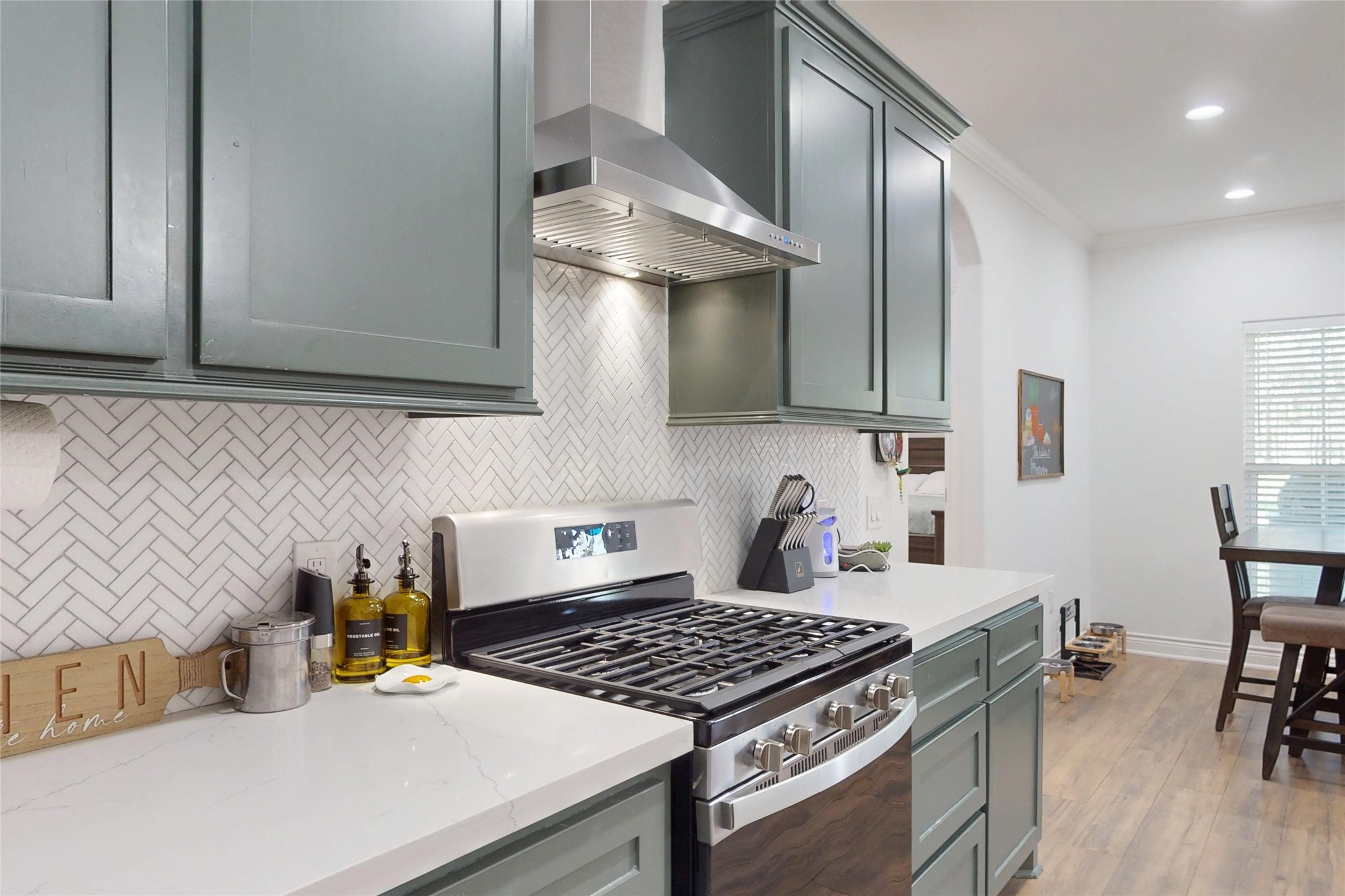 7815 Timber Switch Road Cleveland, TX 77328 - Photo 15 of 40 a kitchen with a stove and a refrigerator
