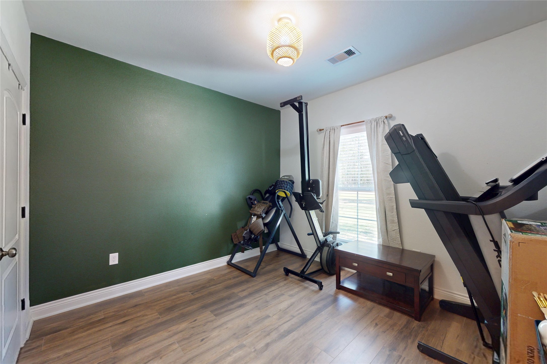 7815 Timber Switch Road Cleveland, TX 77328 - Photo 22 of 40 a view of a room with gym equipment