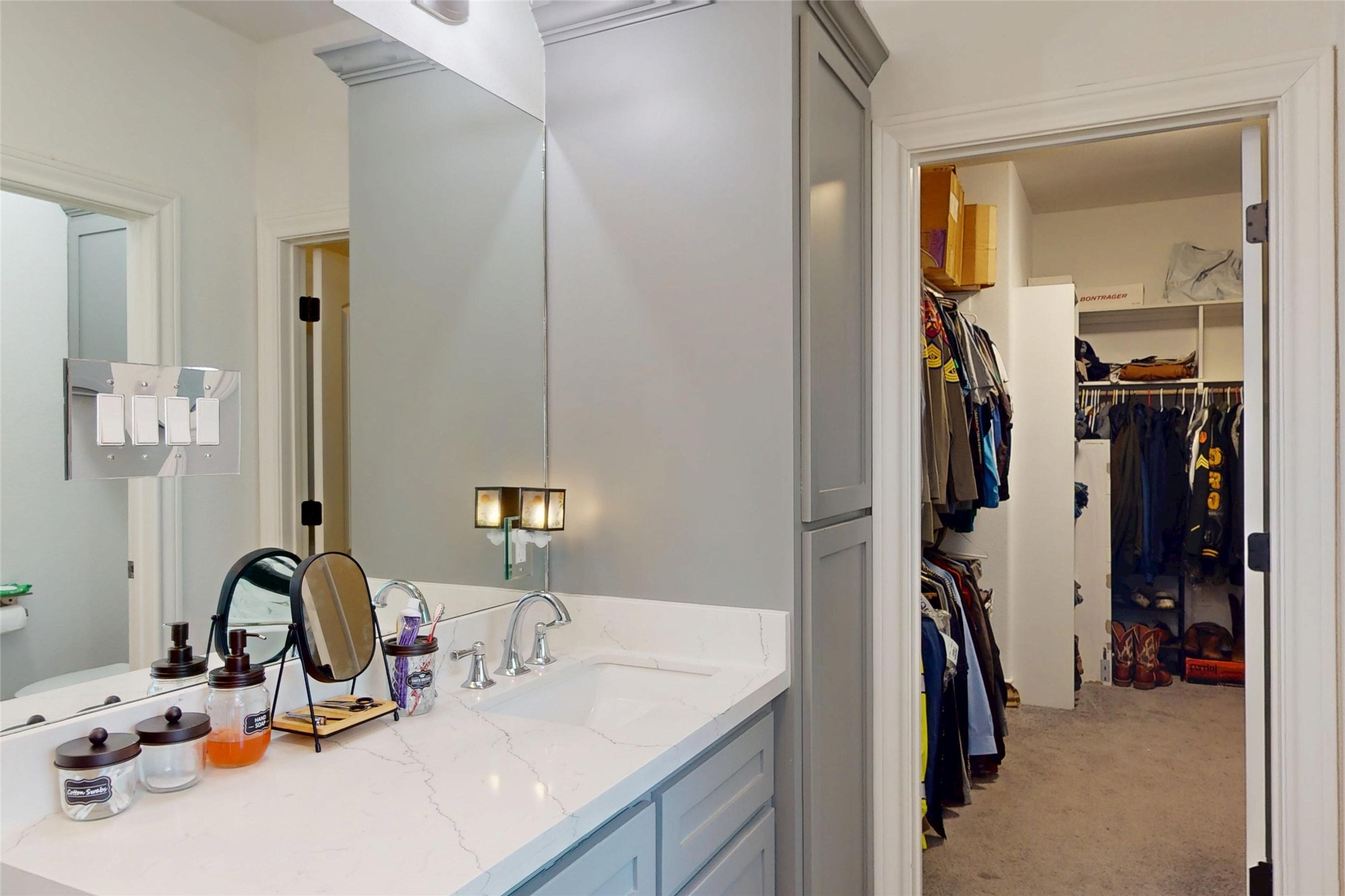 7815 Timber Switch Road Cleveland, TX 77328 - Photo 33 of 40 a view of a bathroom sink and a mirror