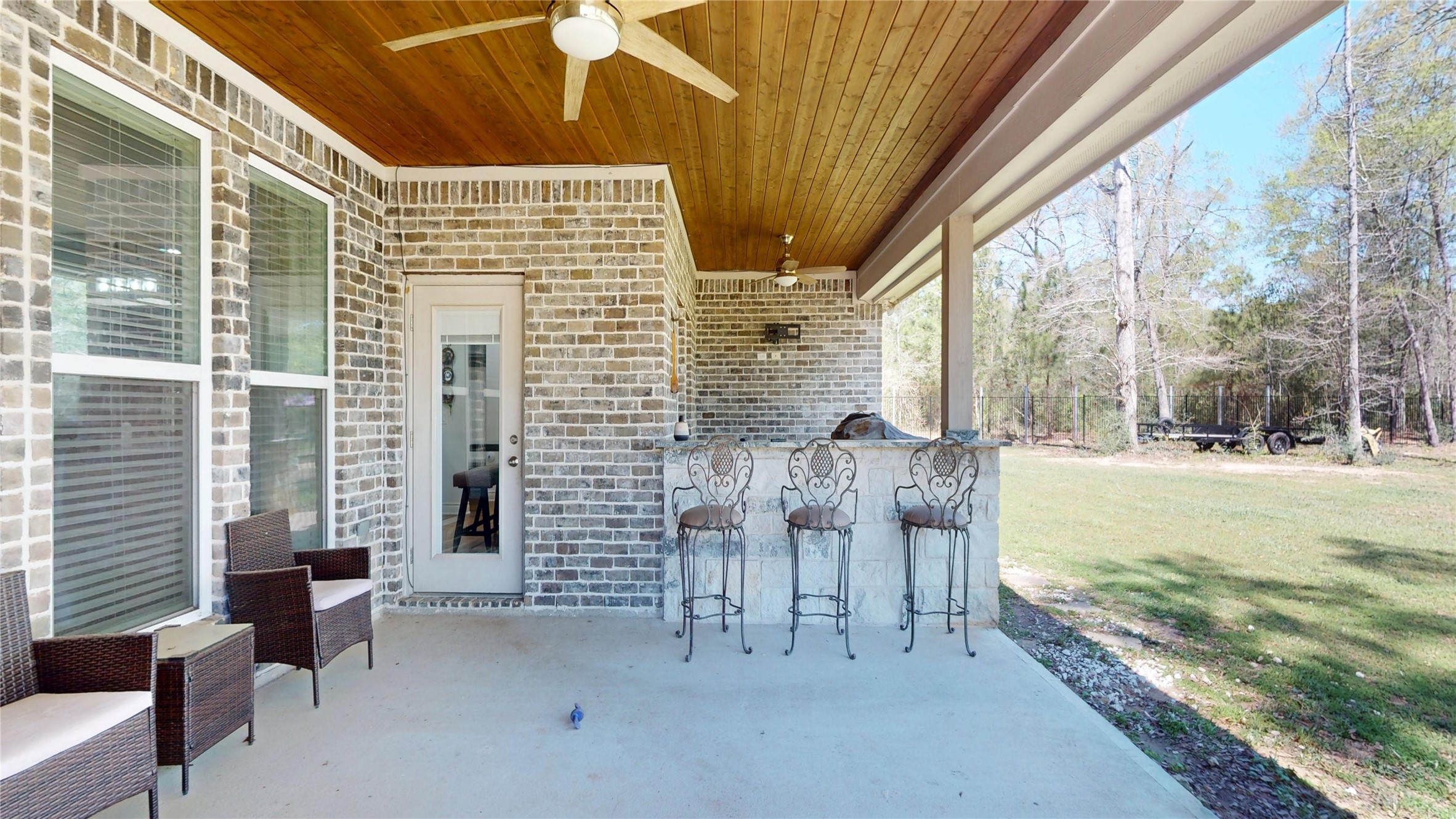 7815 Timber Switch Road Cleveland, TX 77328 - Photo 37 of 40 a view of an outdoor space with seating area