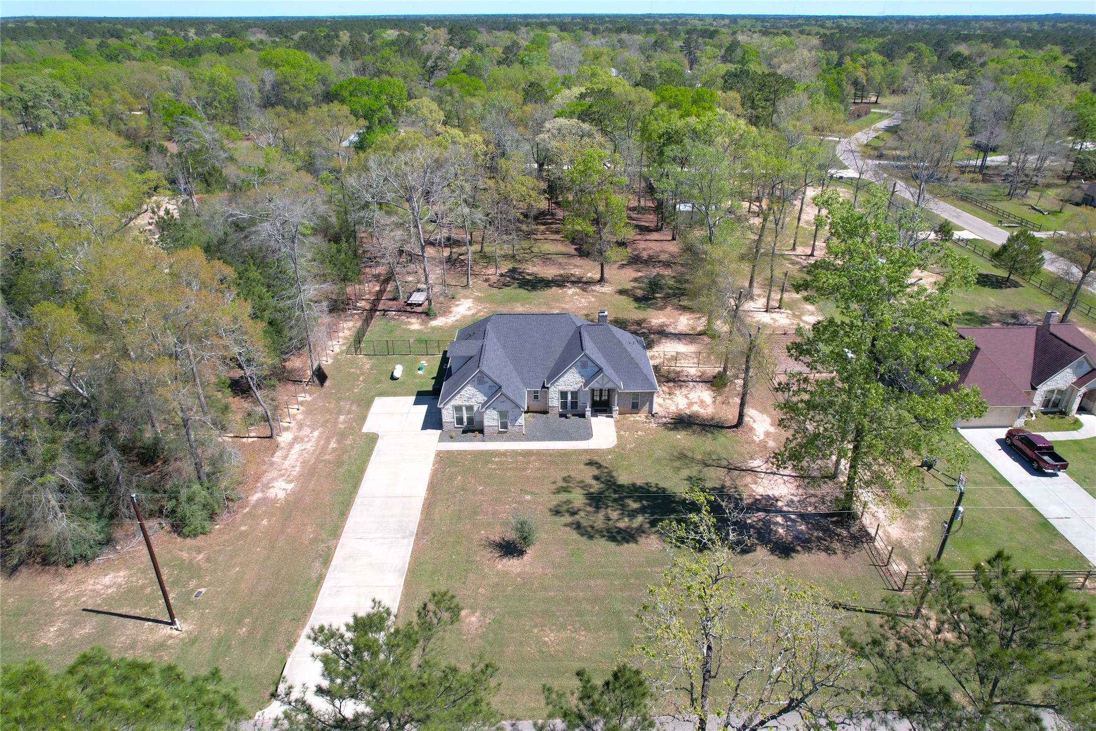 7815 Timber Switch Road Cleveland, TX 77328 - Photo 7 of 40 an aerial view of a house with a yard