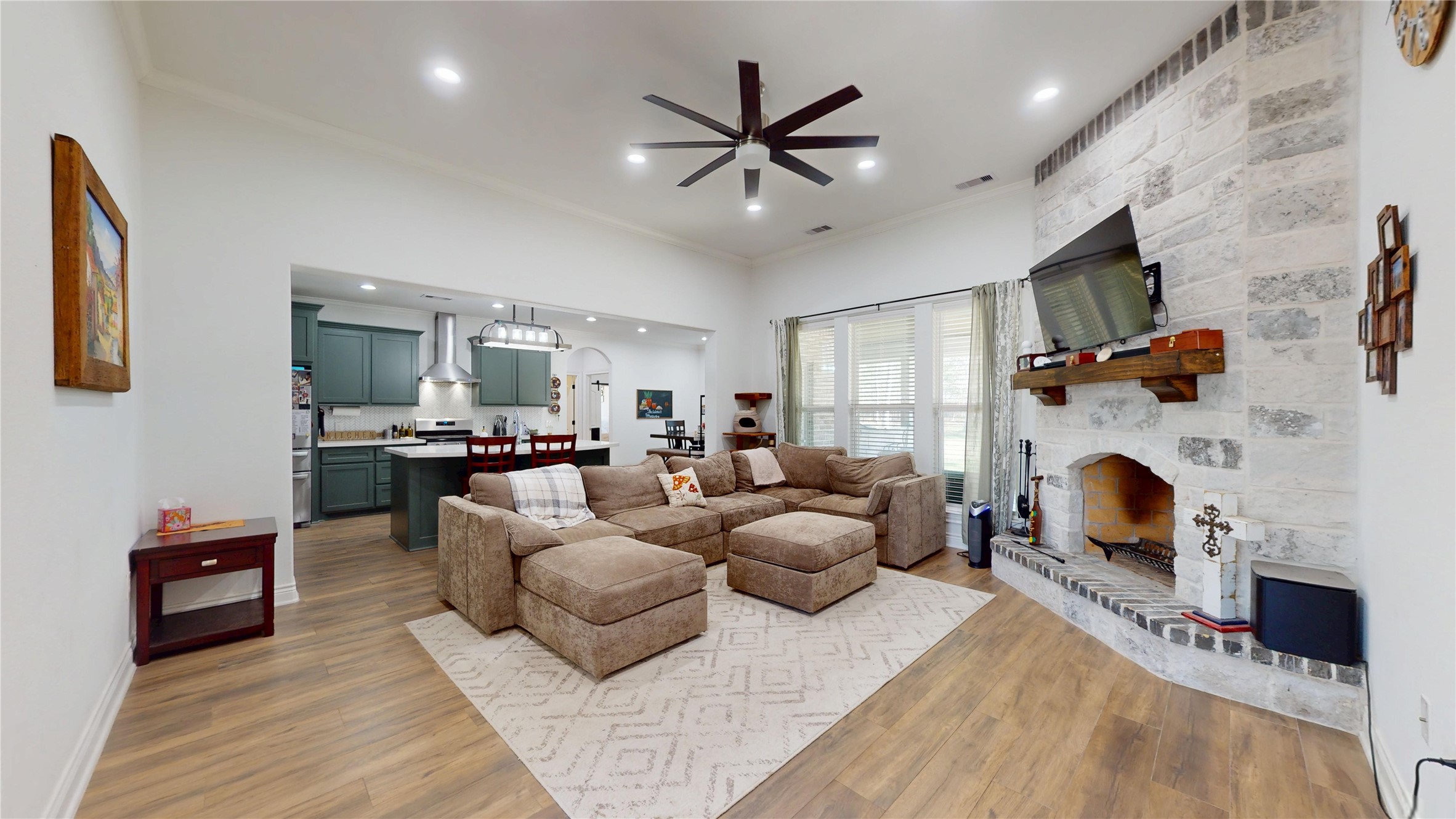 7815 Timber Switch Road Cleveland, TX 77328 - Photo 9 of 40 a living room with furniture and a fireplace