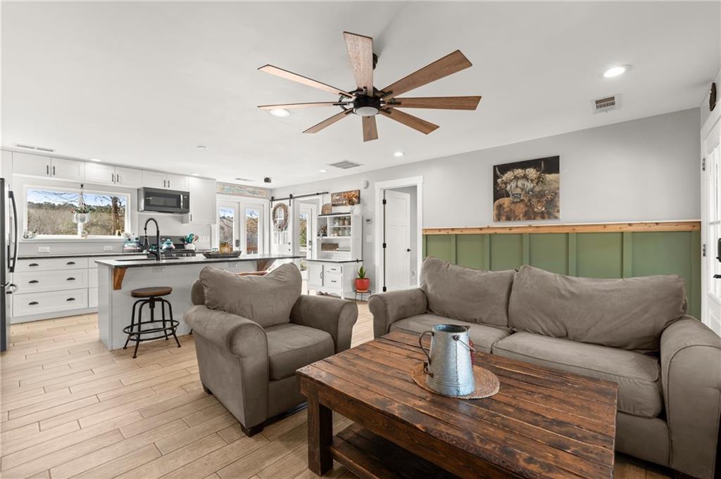 38 Hightower Road Talking Rock, GA 30175 - Photo 15 of 48 a living room with furniture and kitchen view