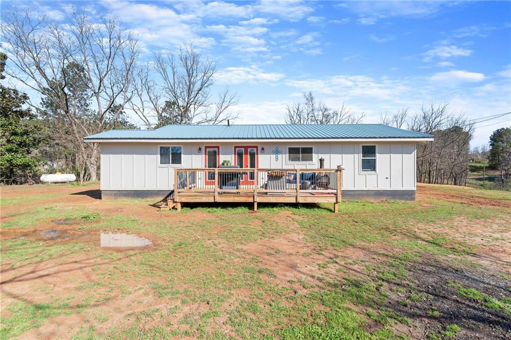 38 Hightower Road Talking Rock, GA 30175 - Photo 34 of 48 a view of a house with swimming pool and sitting area