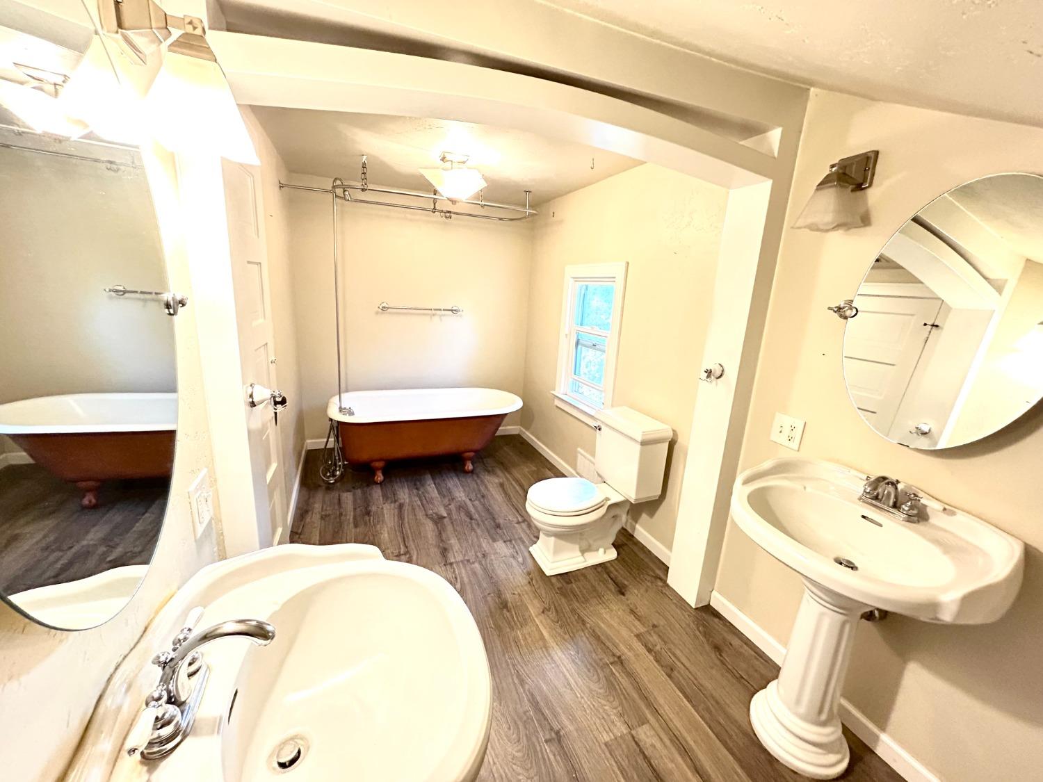 859 F Street Reedley, CA 93654 - Photo 18 of 28 a bathroom with a sink and a mirror
