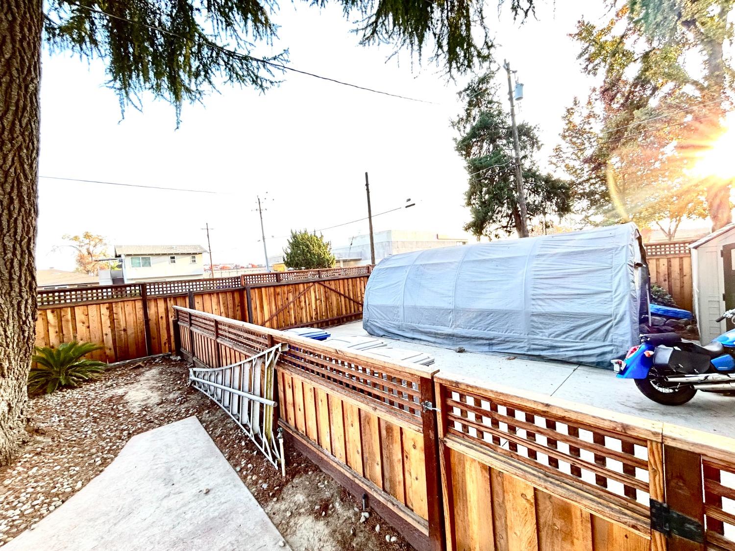 859 F Street Reedley, CA 93654 - Photo 23 of 28 a view of outdoor space and deck