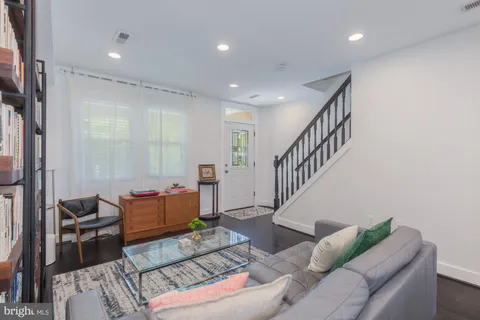 a bedroom with bed and window