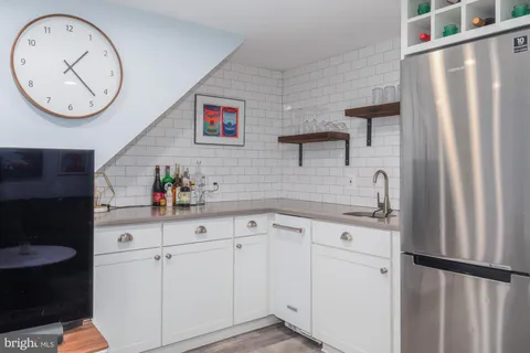 a workspace with furniture and wooden floor
