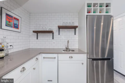 a workspace with furniture and window