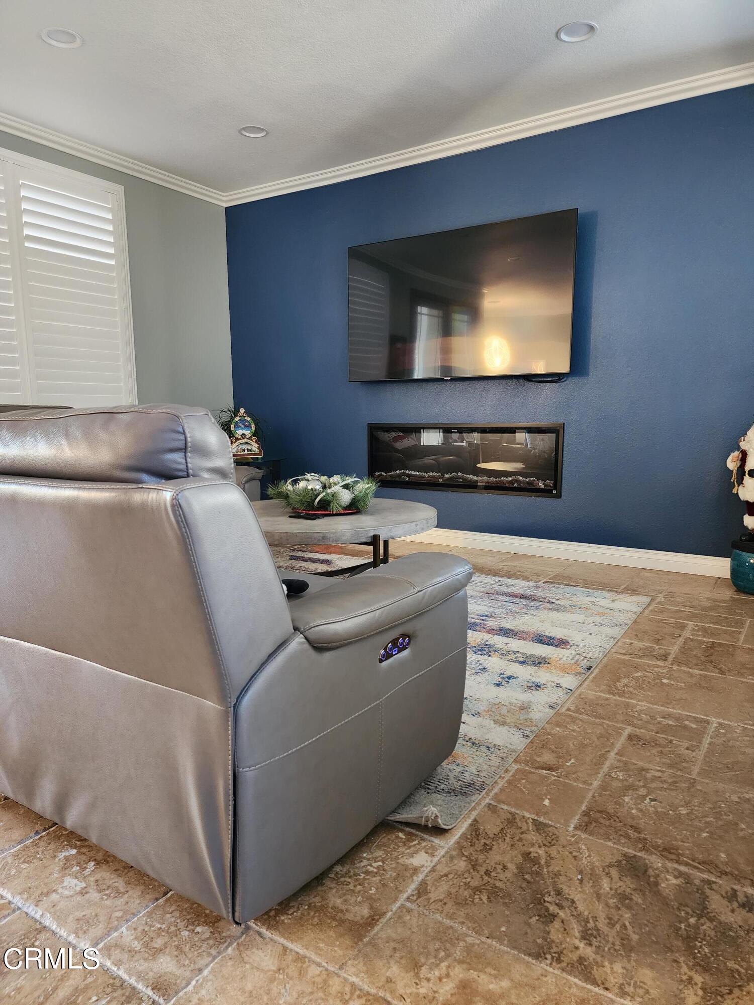 998 Arrasmith Lane Fillmore, CA 93015 - Photo 11 of 40 a living room with furniture and a flat screen tv
