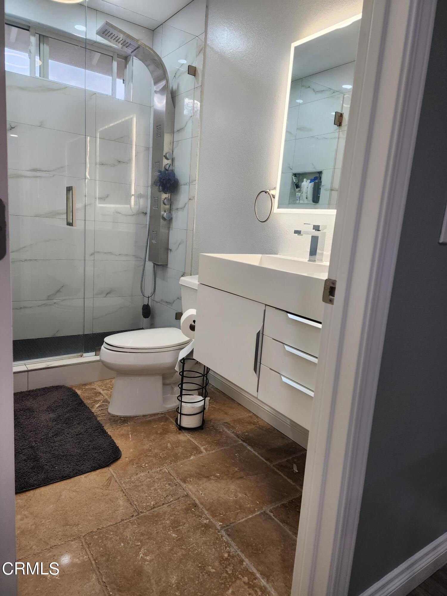 998 Arrasmith Lane Fillmore, CA 93015 - Photo 34 of 40 a bathroom with a sink a toilet and shower