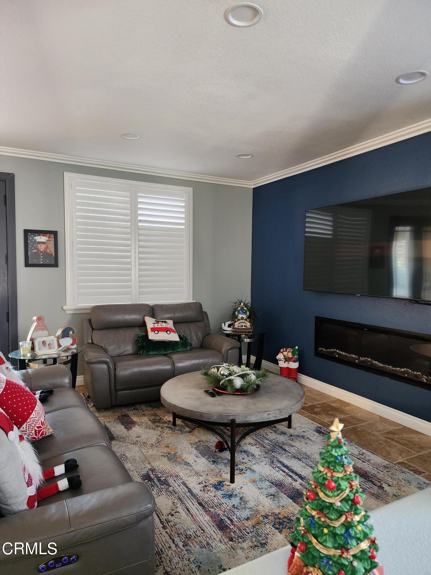 998 Arrasmith Lane Fillmore, CA 93015 - Photo 9 of 40 a living room with furniture and a flat screen tv