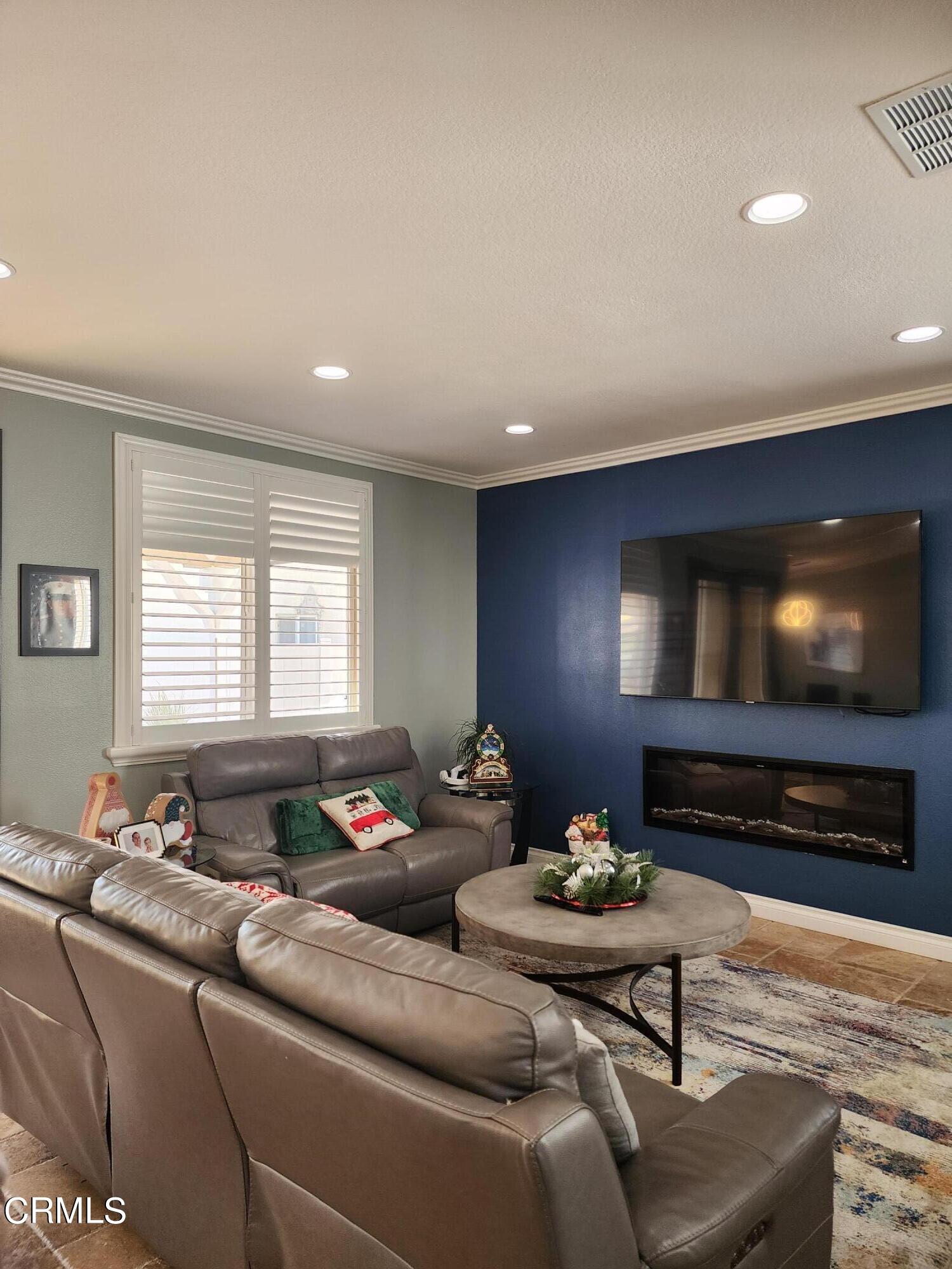 998 Arrasmith Lane Fillmore, CA 93015 - Photo 10 of 40 a living room with furniture and a flat screen tv