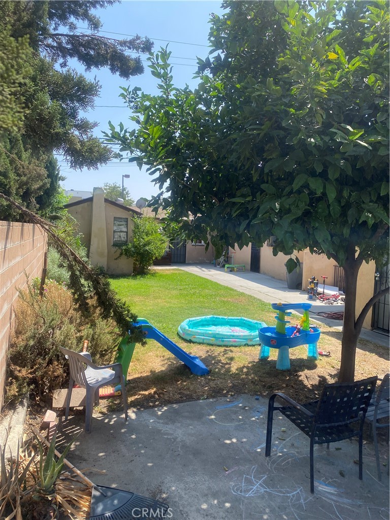 11016 Concert Street El Monte, CA 91731 - Photo 17 of 22 a view of a backyard with plants and outdoor seating