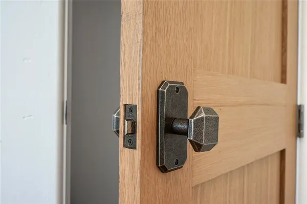 a house with swimming pool in front of it