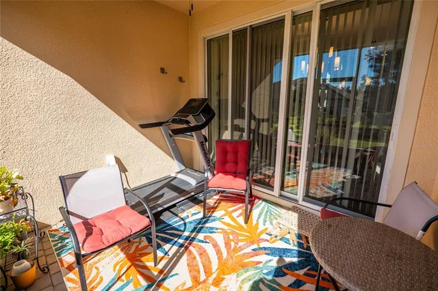 a view of a living room with furniture