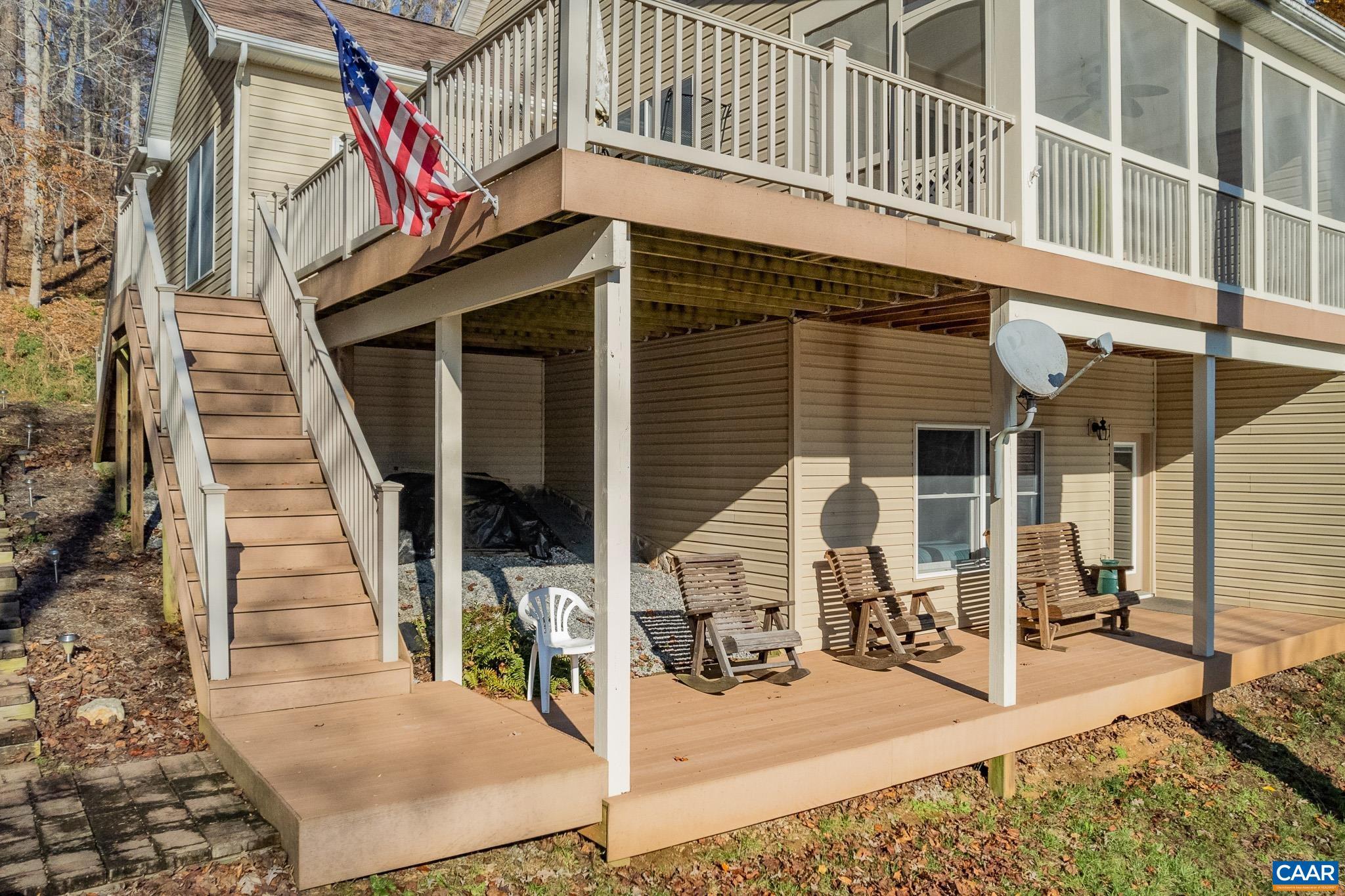 909 Gap Bridge Road Moneta, VA 24121 - Photo 15 of 75 a view of a house with wooden fence
