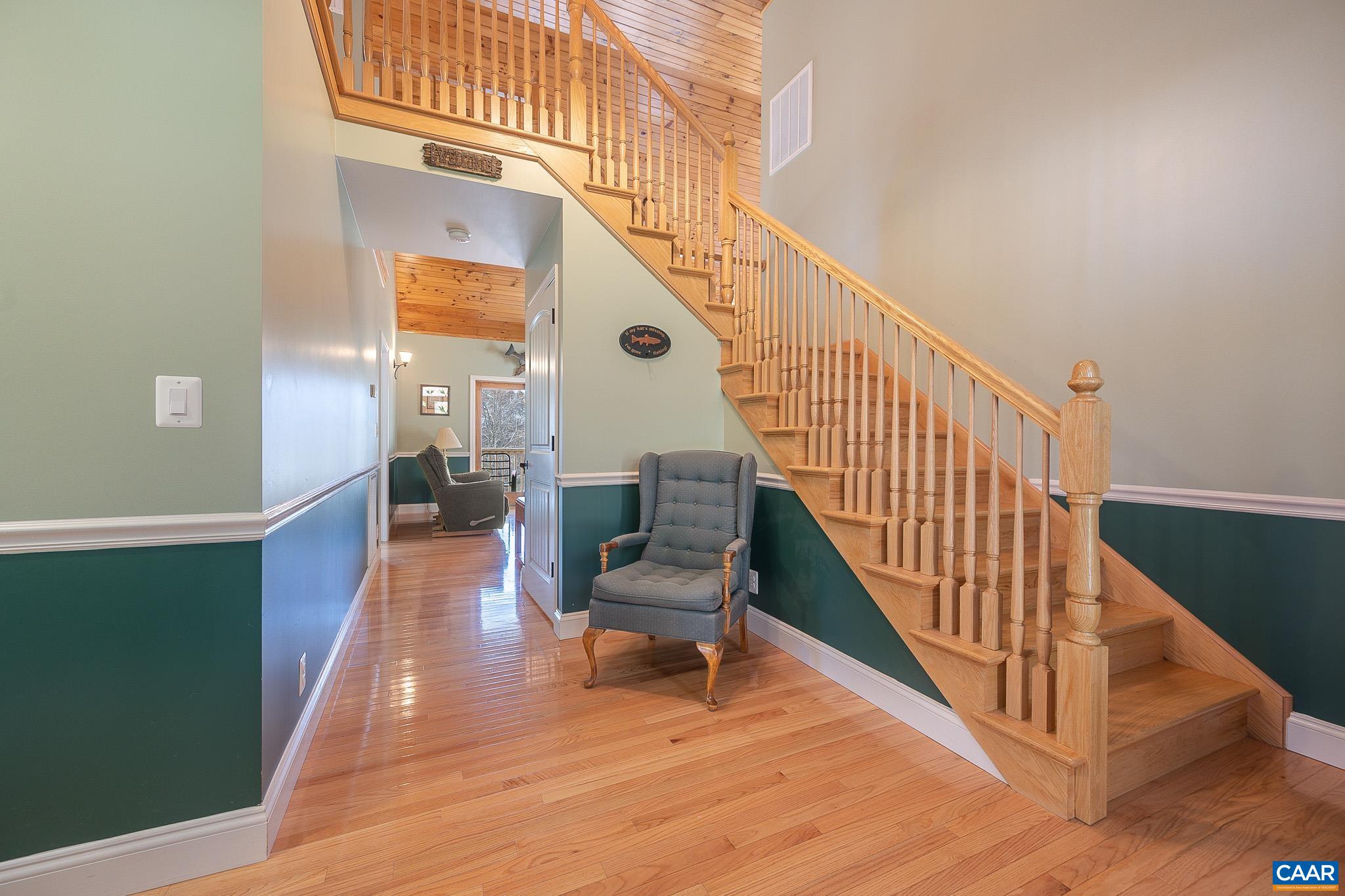 909 Gap Bridge Road Moneta, VA 24121 - Photo 25 of 75 a view of entryway and hall with wooden floor