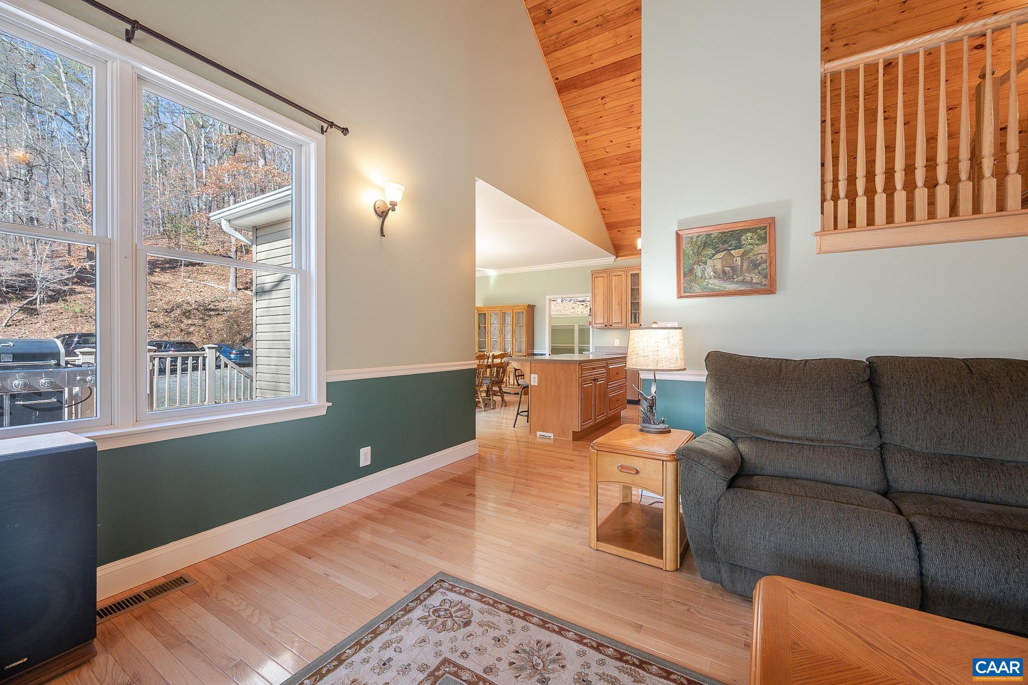 909 Gap Bridge Road Moneta, VA 24121 - Photo 28 of 75 a living room with furniture and a window