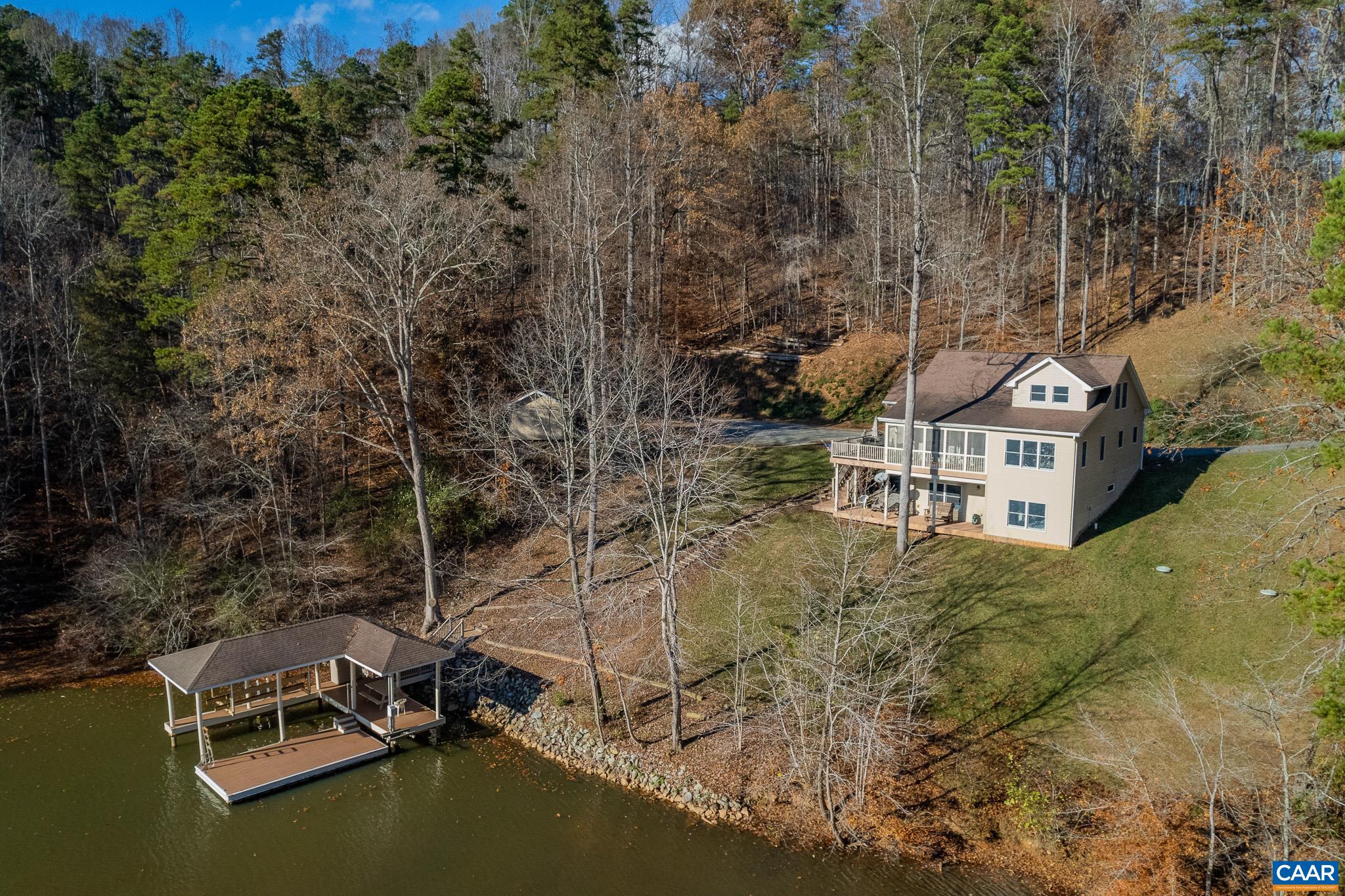 909 Gap Bridge Road Moneta, VA 24121 - Photo 3 of 75 a view of a house with a yard