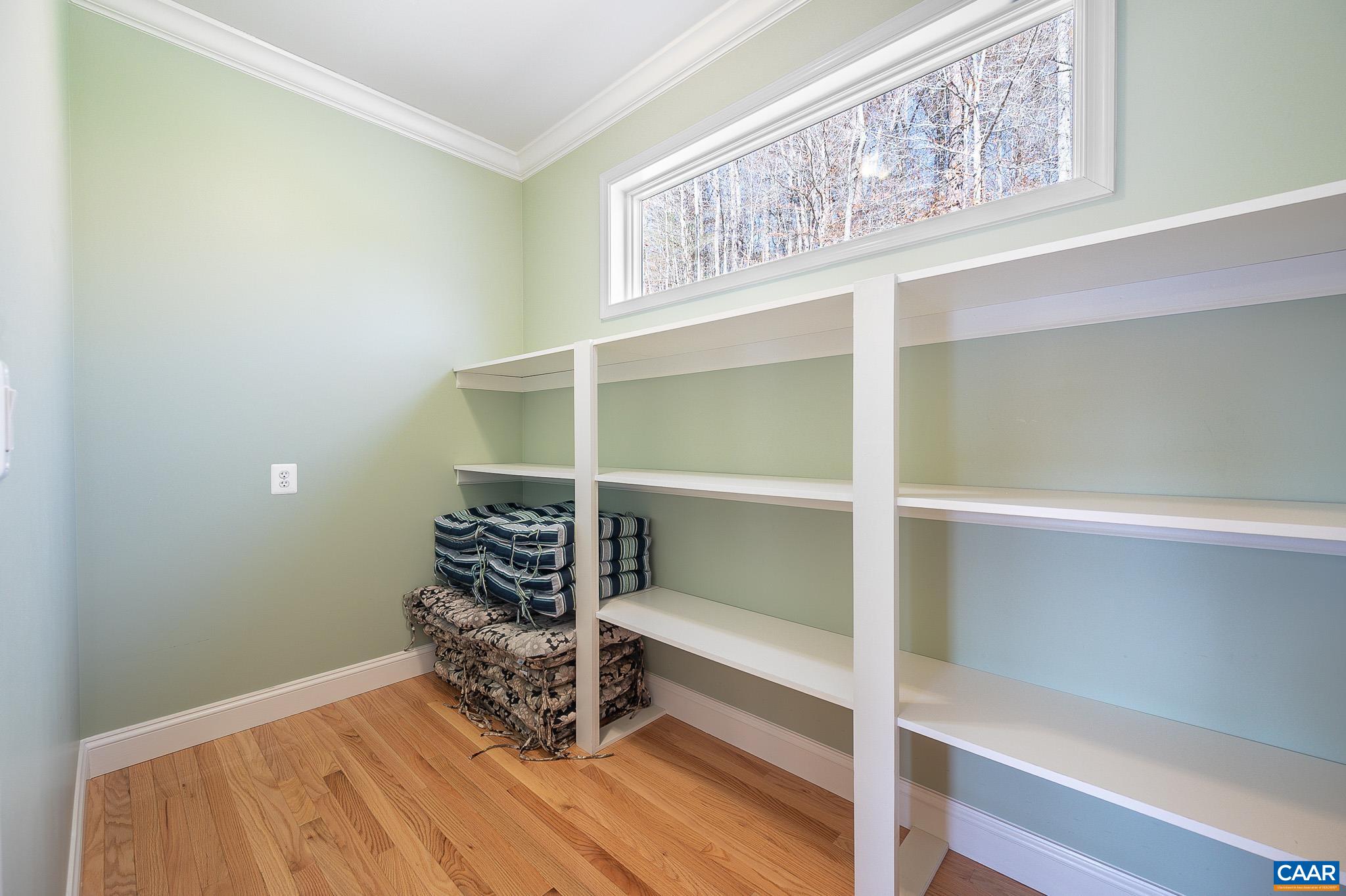 909 Gap Bridge Road Moneta, VA 24121 - Photo 36 of 75 a view of an empty room with wooden floor