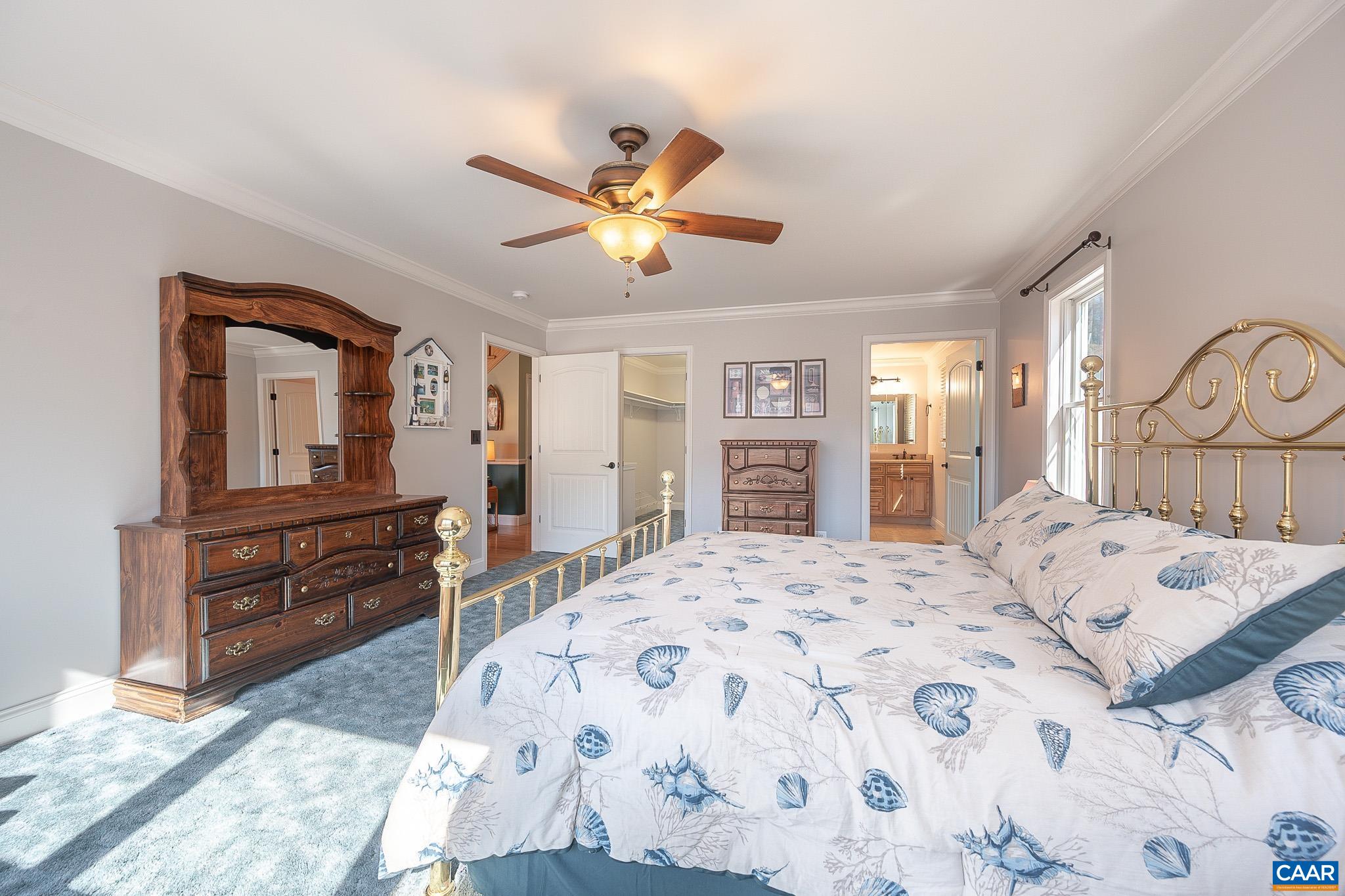 909 Gap Bridge Road Moneta, VA 24121 - Photo 41 of 75 a bedroom with a bed and dresser with mirror