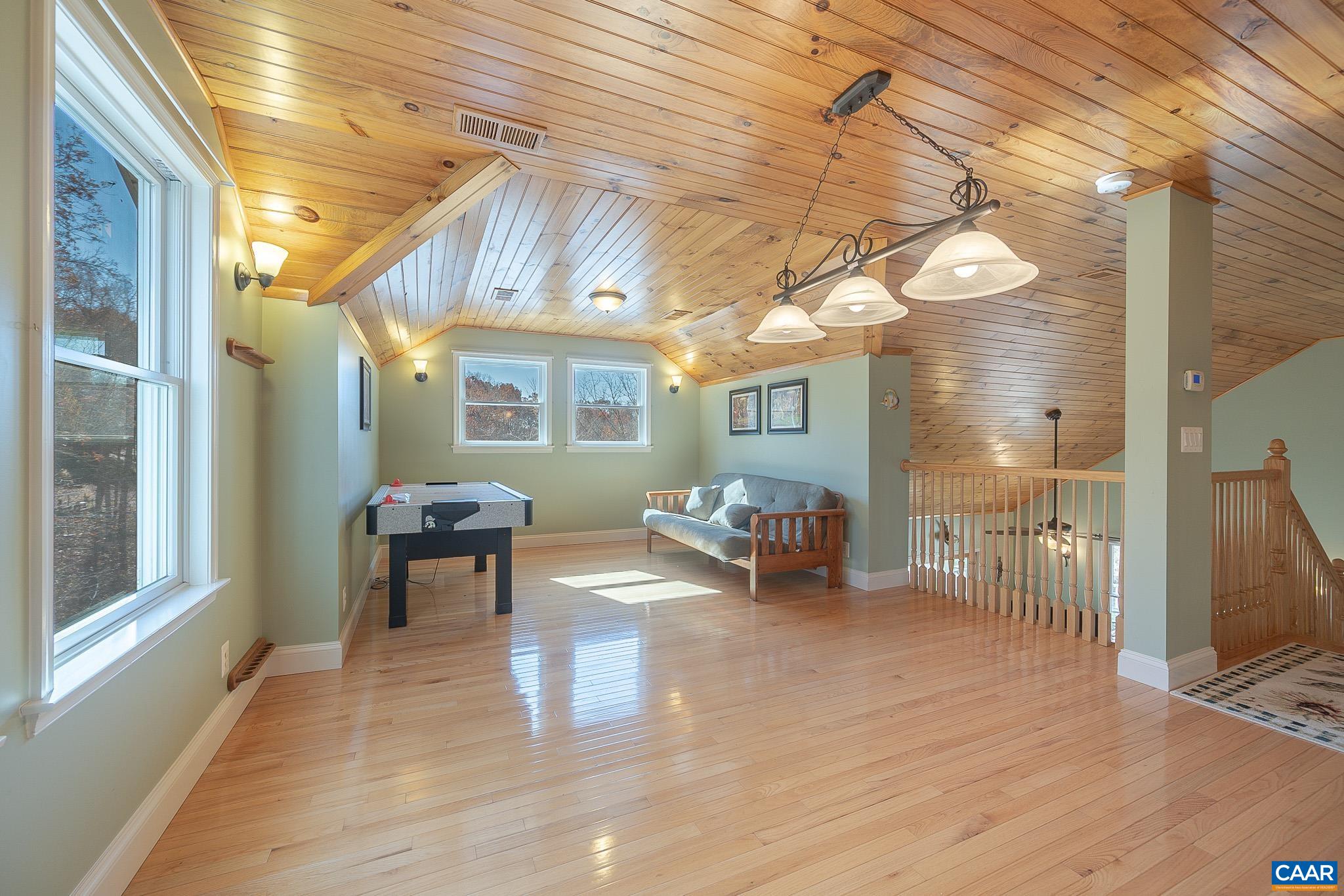 909 Gap Bridge Road Moneta, VA 24121 - Photo 50 of 75 a view of a porch with furniture and a window