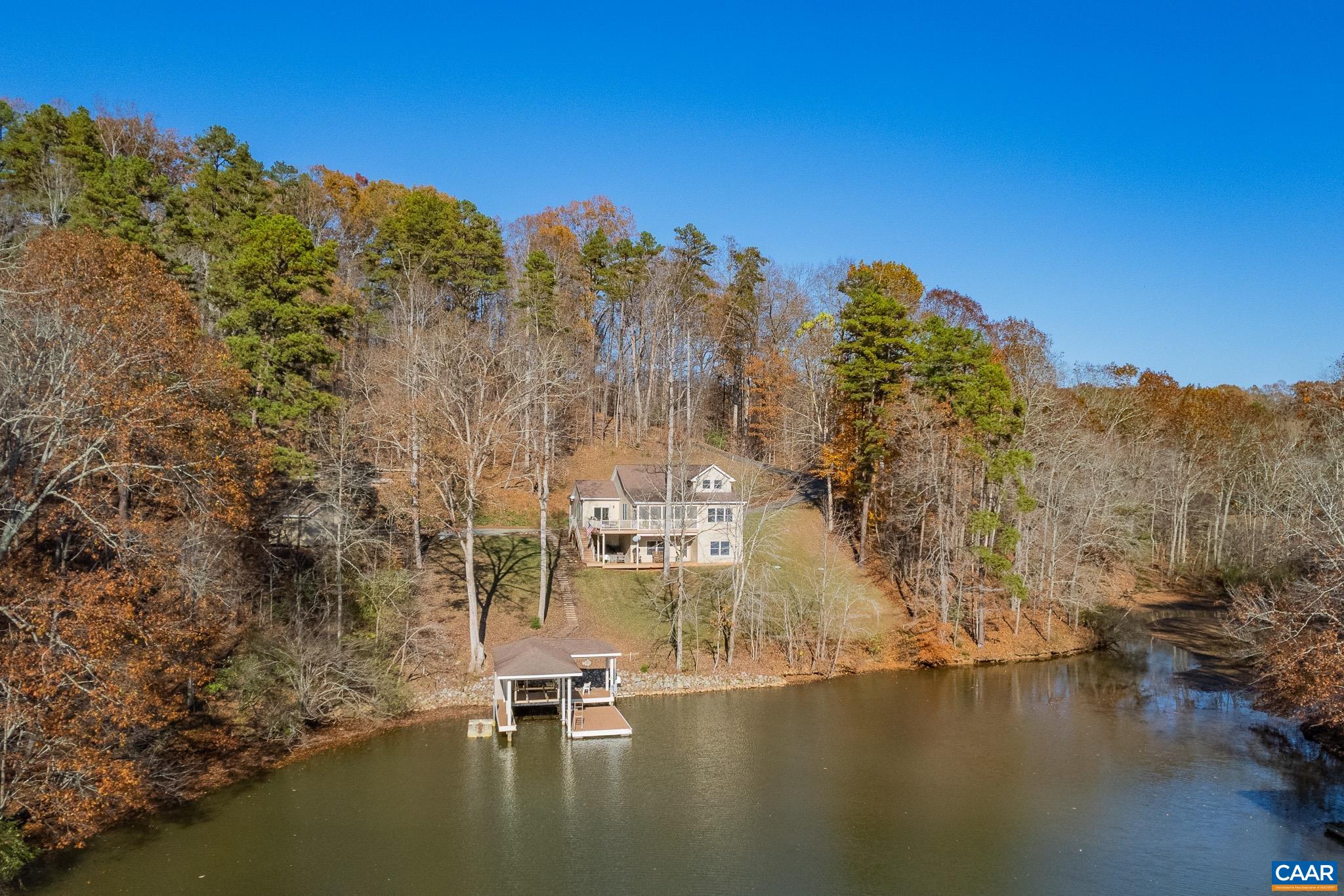 909 Gap Bridge Road Moneta, VA 24121 - Photo 5 of 75 a view of a lake with houses