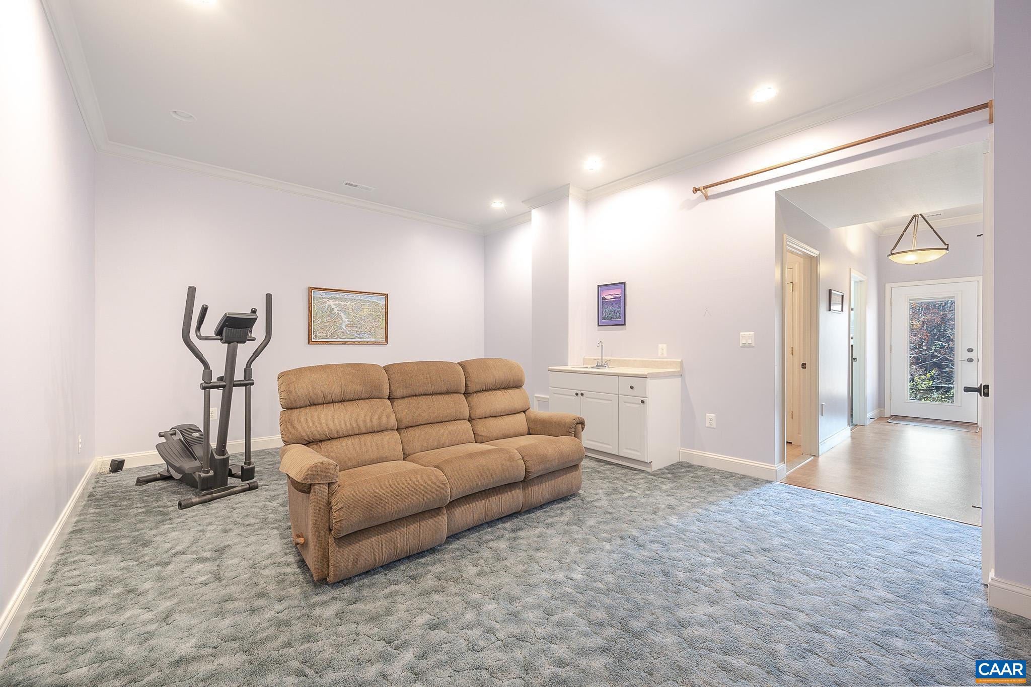 909 Gap Bridge Road Moneta, VA 24121 - Photo 53 of 75 a living room with furniture and a table