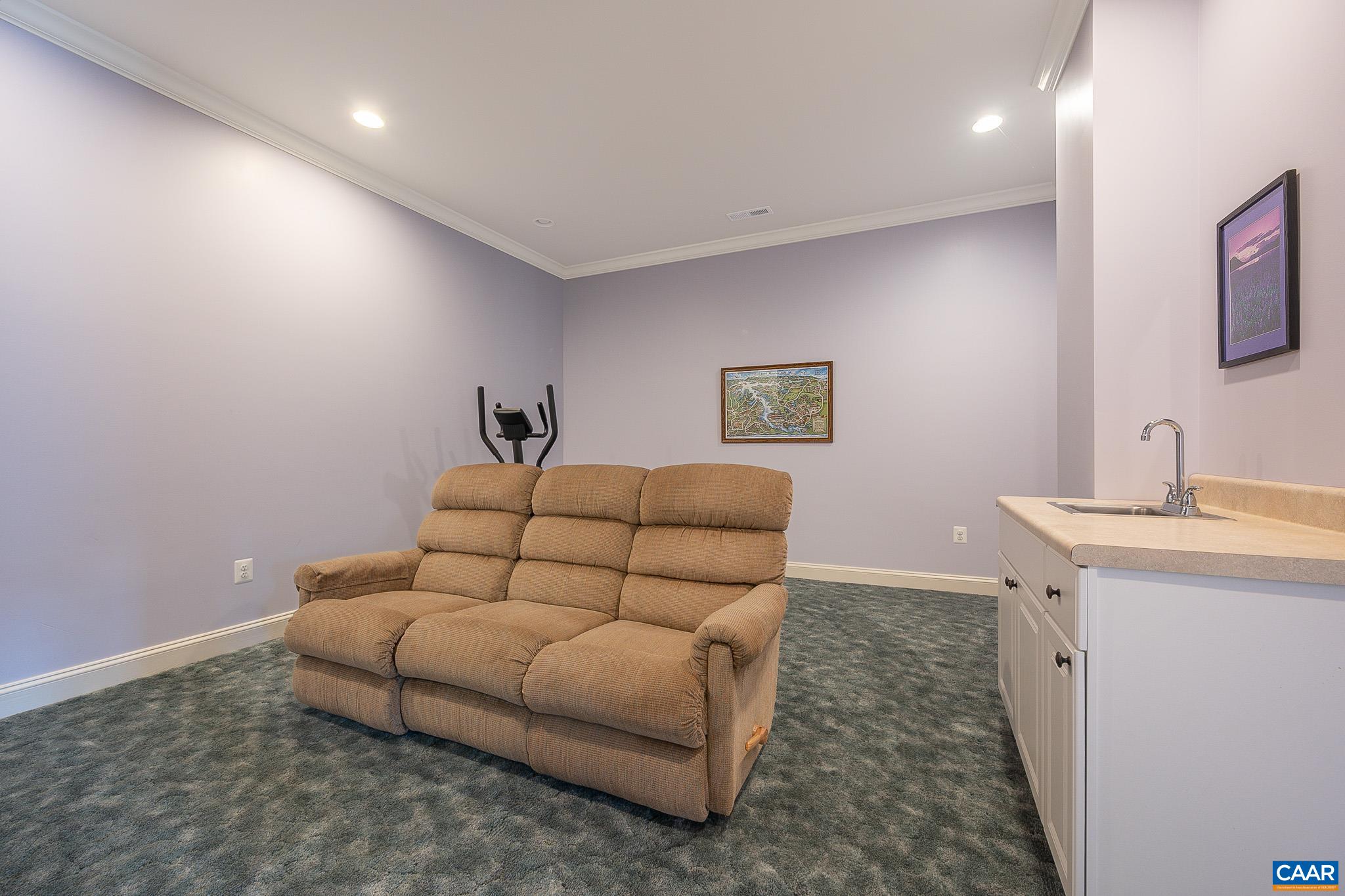 909 Gap Bridge Road Moneta, VA 24121 - Photo 55 of 75 a living room with furniture and a mirror