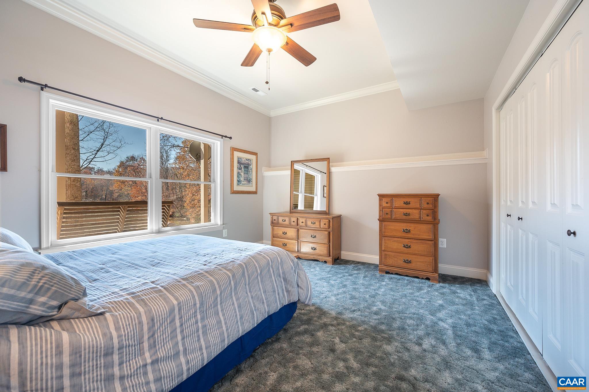 909 Gap Bridge Road Moneta, VA 24121 - Photo 59 of 75 a bedroom with a bed and a window