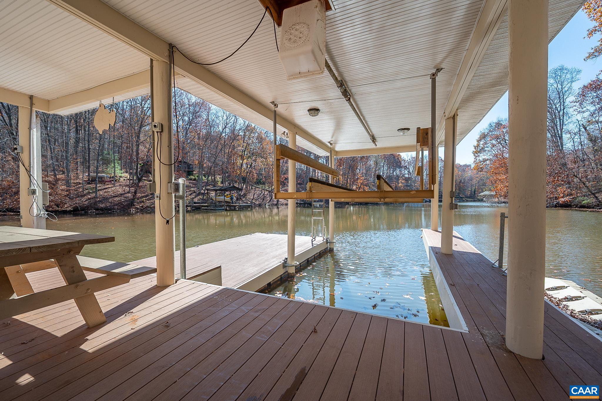 909 Gap Bridge Road Moneta, VA 24121 - Photo 70 of 75 a view of a balcony with wooden floor