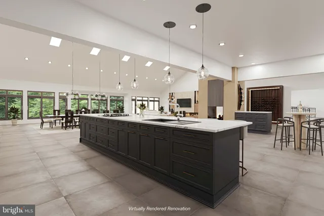 a kitchen with stainless steel appliances granite countertop a sink a counter top space and cabinets