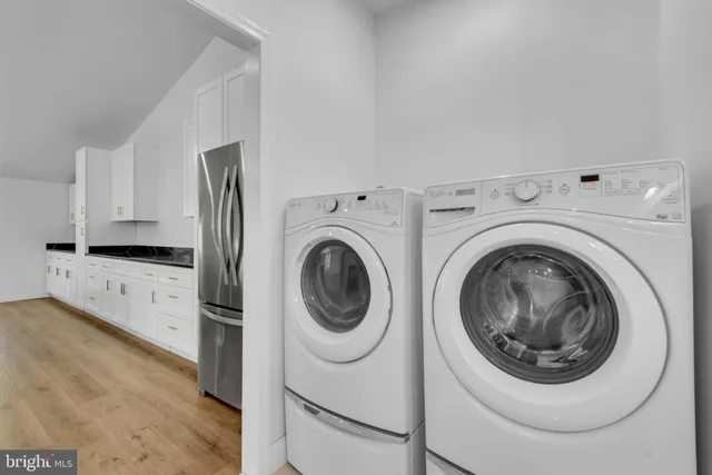 a utility room with dryer and washer