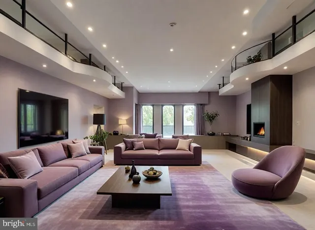 a living room with furniture couches and kitchen view
