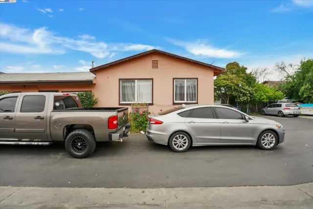 a car parked in front of a house