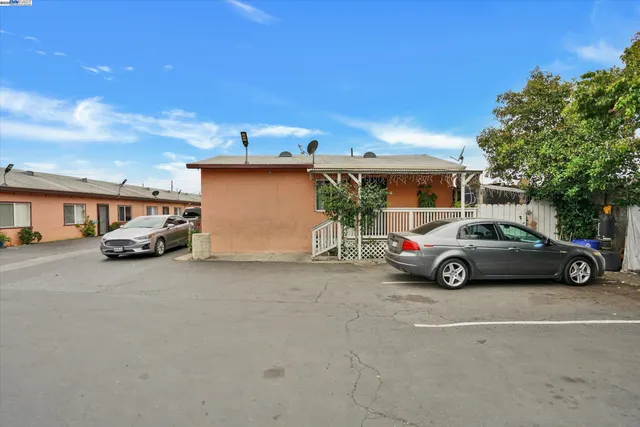 a view of street with parked cars