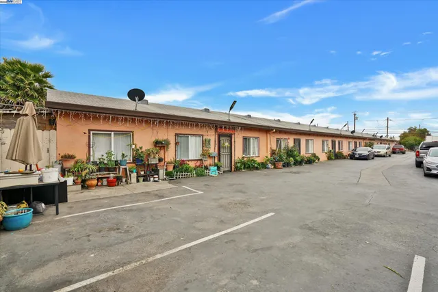 a view of a car park in front of a building