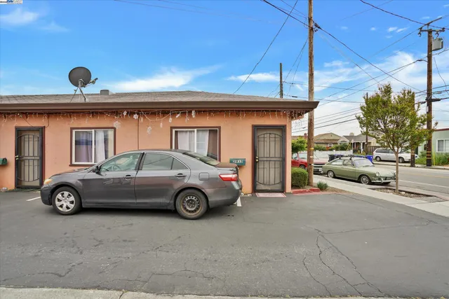 a car parked in front of a building